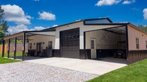 white metal building structure with a black roof trim